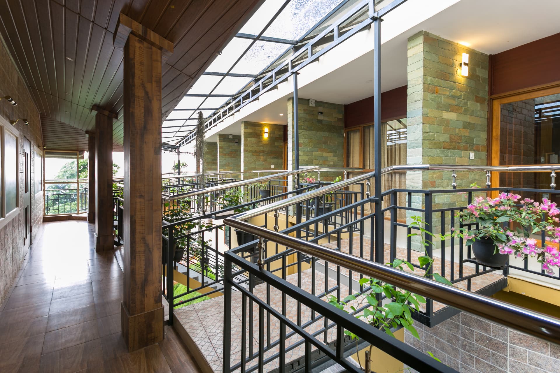 Sheltered timber corridor running past the Deluxe Non Valley View Room doors