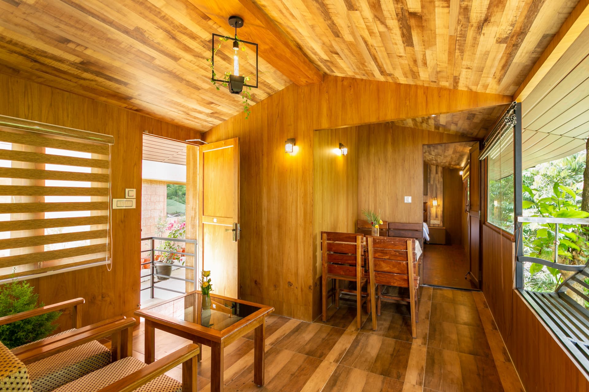 Lounge and dining area of the Family Suite Hut, linking the two interconnected bedrooms